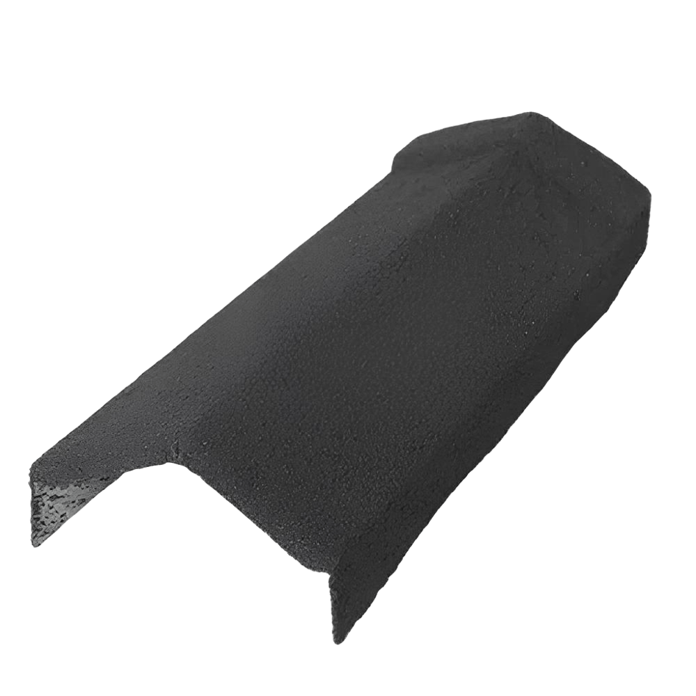 A single dark gray, textured roof accessory is shown close-up, isolated from a surrounding scene. It has a raised rounded ridge along the upper center and two angled side flanges extending downward. The cut ends and granular surface texture are visible.